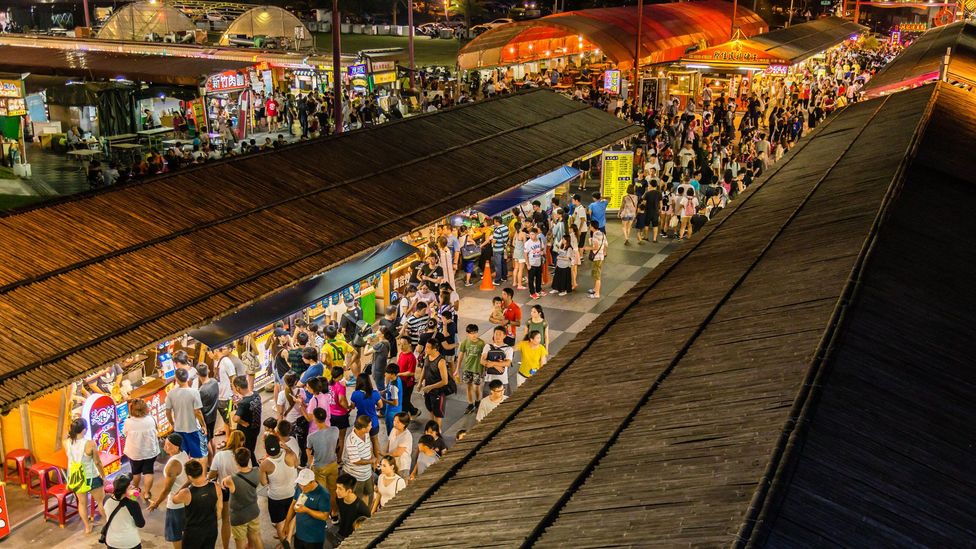 Locals are also drawn to Taiwan’s night markets for their buzzing atmosphere, which is often described as ‘renao’, or ‘hot and noisy’ (Credit: Images By Kenny/Alamy)