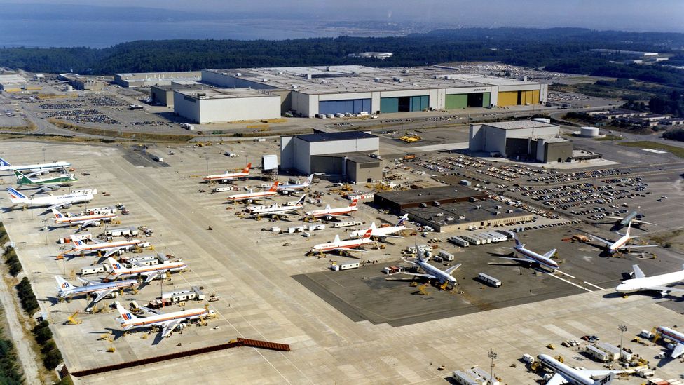 The finished aircraft are towed over a bridge to a nearby airport (Credit: Boeing) The finished aircraft are towed over a bridge to a nearby airport (Credit: Boeing)