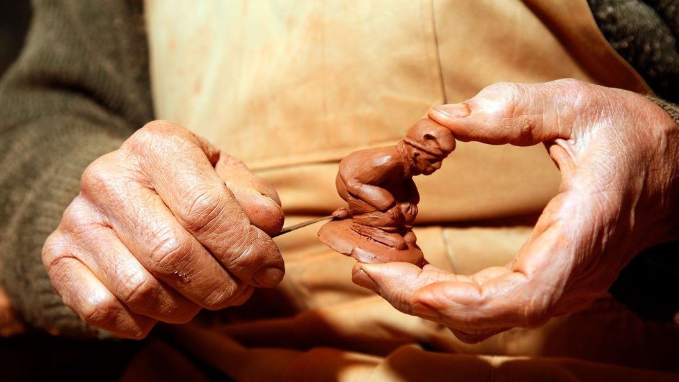 The caganer is believed to date back to the late 17th or early 18th Century, when realism was the focus of art, sculpture and literature (Credit: Miquel Benitez/Getty Images) The caganer is believed to date back to the late 17th or early 18th Century, when realism was the focus of art, sculpture and literature (Credit: Miquel Benitez/Getty Images)
