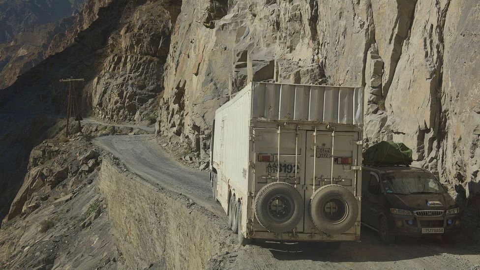 Vehicles navigate the Pamir Highway in Tajikistan