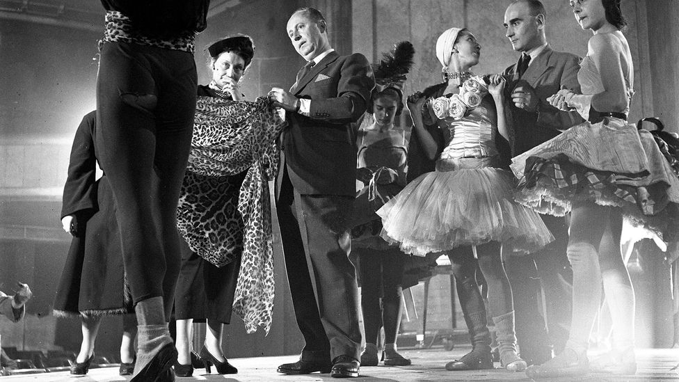 Christian Dior and Madame Bricard, seen here at the Paris ballet, were close collaborators (Credit: Getty Images)
