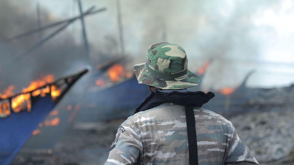 Indonesia has destroyed hundreds of illegal fishing vessels by burning them, or sinking them off shore (Credit: Getty Images)