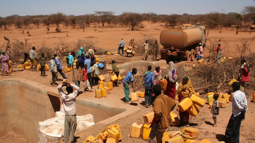 Families carry water during a drought in Ethiopia; temperature rise already has altered weather and water systems in profound ways (Credit: Creative Commons)