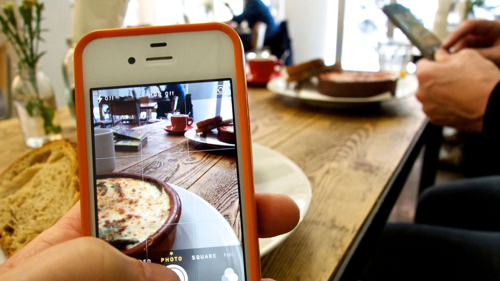 Thanks to social media influencers and a host of foodie bloggers, food has become a clickable status symbol (Credit: Getty Images) Thanks to social media influencers and a host of foodie bloggers, food has become a clickable status symbol (Credit: Getty Images)