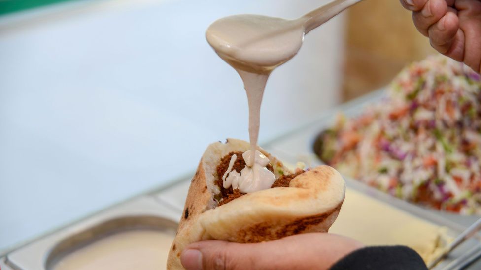 Qizha’s colour and taste make it less popular than its sibling, tahini (Credit: Food for Thought/Alamy) Qizha’s colour and taste make it less popular than its sibling, tahini (Credit: Food for Thought/Alamy)