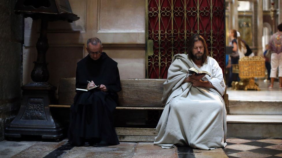 A pilgrim reads the Bible at Jerusalem’s Church of the Holy Sepulchre (Credit: Getty) A pilgrim reads the Bible at Jerusalem’s Church of the Holy Sepulchre (Credit: Getty)