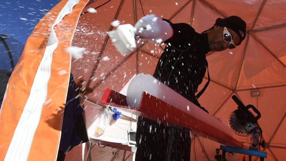 The cores are removed one metre at a time before being prepared for transport down the mountain to a laboratory (Credit: Getty) The cores are removed one metre at a time before being prepared for transport down the mountain to a laboratory (Credit: Getty)