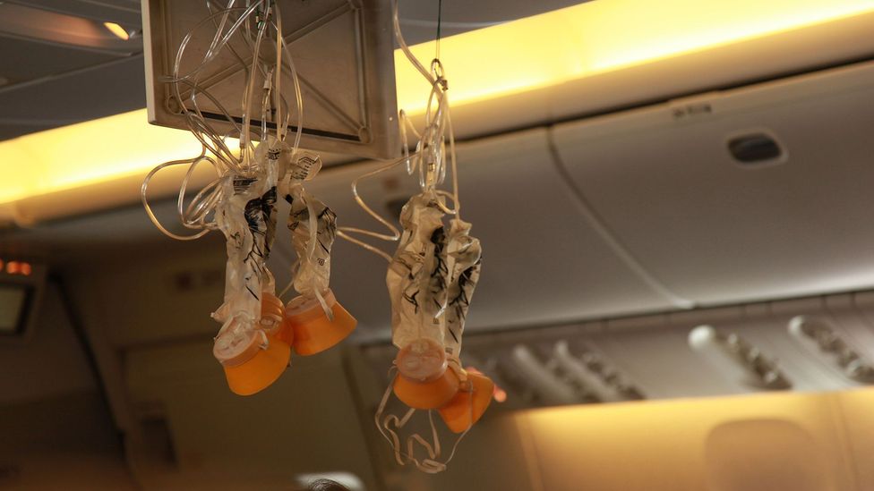 A sudden loss of pressure on an aircraft can leave passengers struggling to breathe in the thin air which is why oxygen masks are provided (Credit: Alamy)