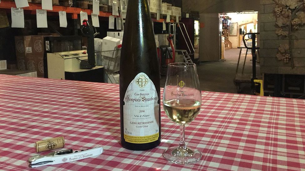 Wine is aged in the Cave Historique des Hospices de Strasbourg for six to 10 months before being made available for purchase (Credit: Melissa Banigan) Wine is aged in the Cave Historique des Hospices de Strasbourg for six to 10 months before being made available for purchase (Credit: Melissa Banigan)
