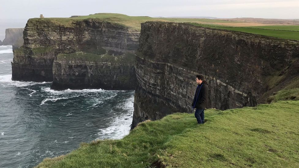 Gary Rizzo, Allison’s partner, takes a moment for himself at the Cliffs of Moher the day before scattering Allison’s ashes in the same location (Credit: Kaylin Frank)