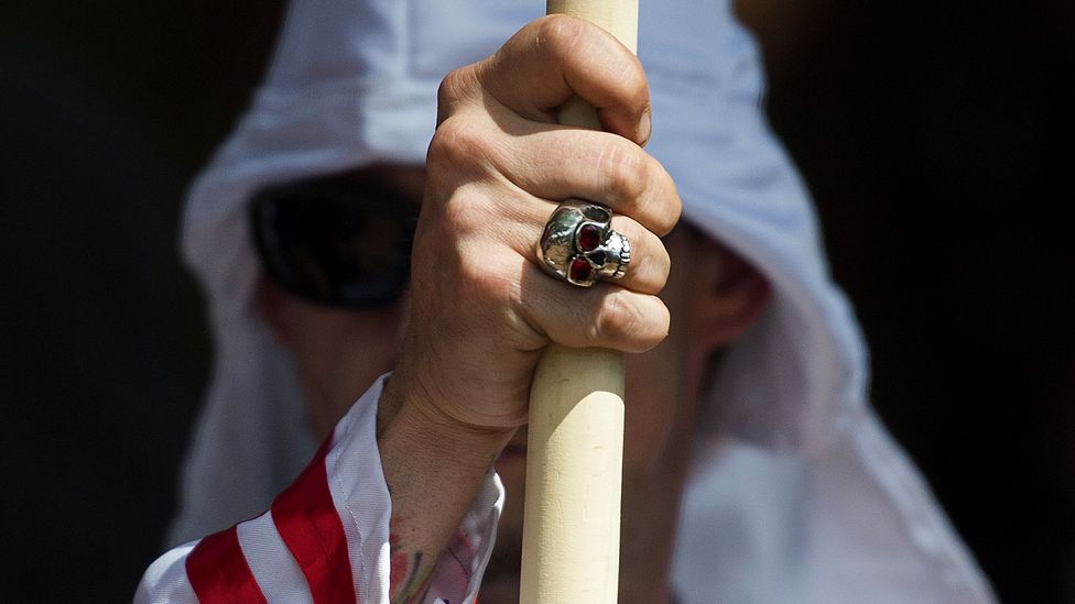 Psychologists are working to understand the reasons that some people turn to extremist organisations like the Ku Klux Klan (Credit: Getty Images)