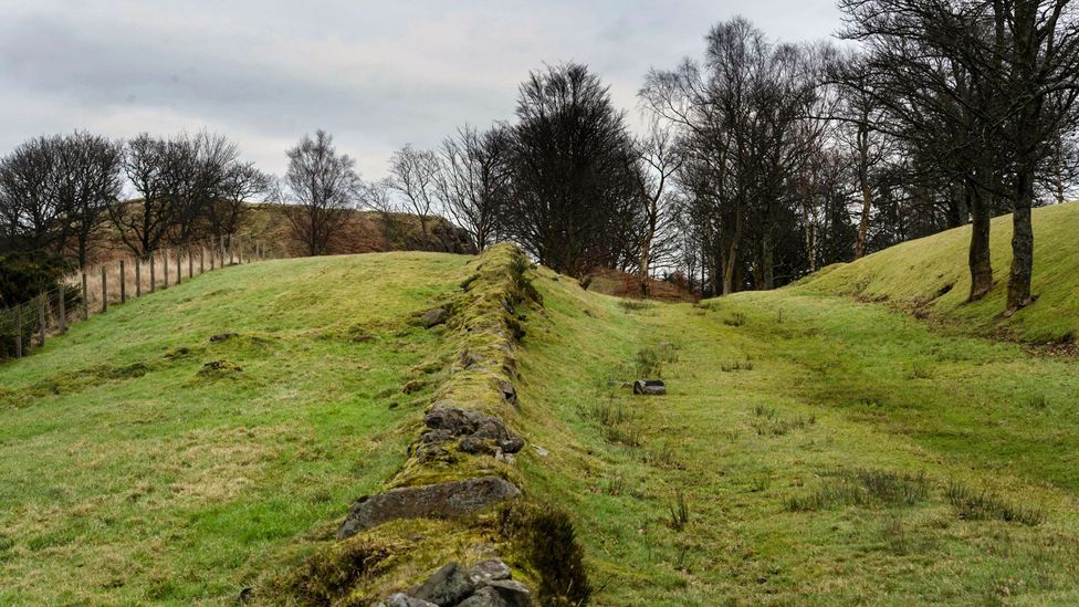 Built around 142 AD, the Antonine Wall once rose as high as 3m and was lined by a defensive ditch as much as 5m deep (Credit: Steven Scott Taylor/Alamy) Built around 142 AD, the Antonine Wall once rose as high as 3m and was lined by a defensive ditch as much as 5m deep (Credit: Steven Scott Taylor/Alamy)