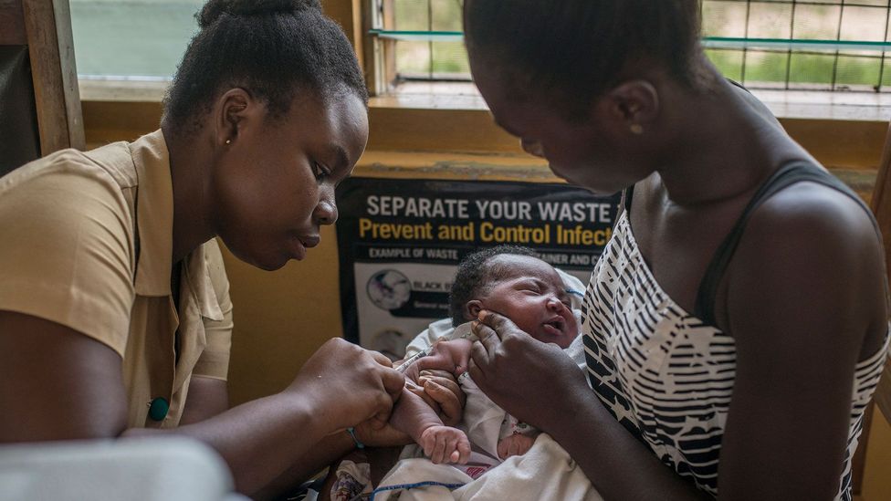 A nurse administers a vaccine to a child at Ewin Polyclinic in Cape Coast, Ghana (Credit: Getty Images)