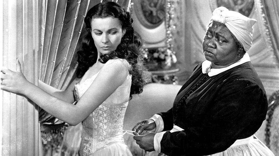 Hattie McDaniel became the first black actor to win an Oscar as Scarlett O’Hara’s house slave in Gone with the Wind (Credit: Alamy)
