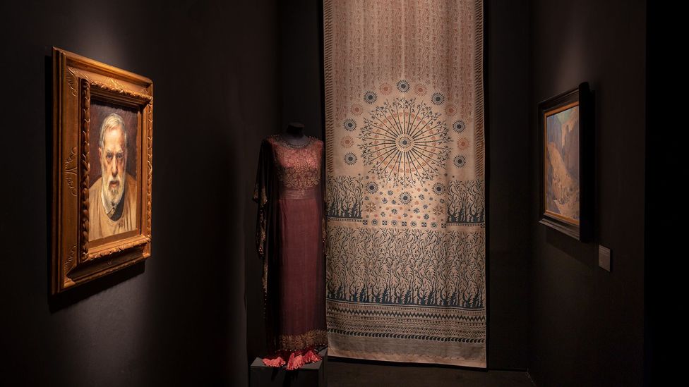A portrait of the legendary couturier is exhibited alongside his work (Credit: Archivio Fotografico Fondazione Musei Civici di Venezia/ Marcello Venturini) A portrait of the legendary couturier is exhibited alongside his work (Credit: Archivio Fotografico Fondazione Musei Civici di Venezia/ Marcello Venturini)