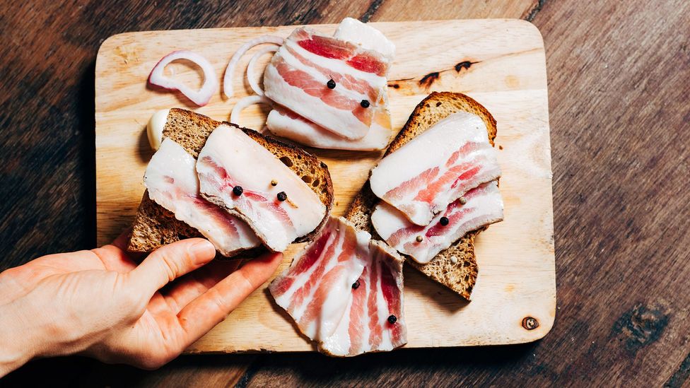 Three ounces or 85g of bacon fat has about 30g of saturated fat, the recommended daily limit for men (Credit: Getty Images)