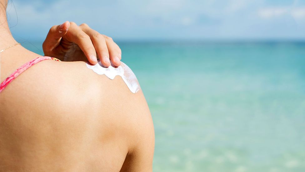 Sunscreen emboldens us to spend longer in the Sun than we would otherwise, which may be one reason why skin cancer rates are rising (Credit: Getty Images)