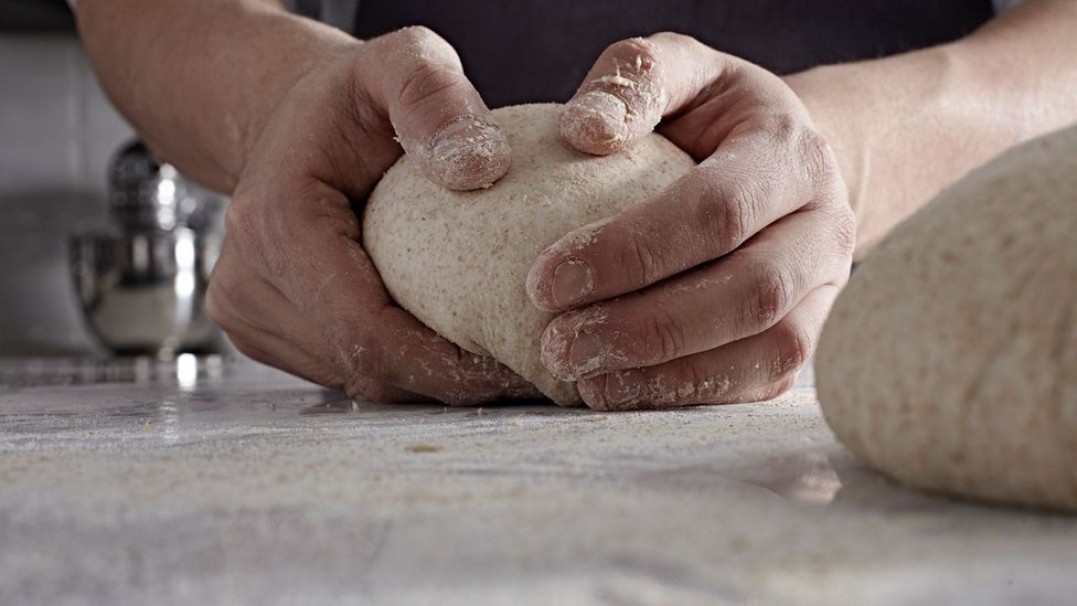 Could the biome on a baker's hands be influencing the texture and taste of the dough? (Credit: Getty Images)