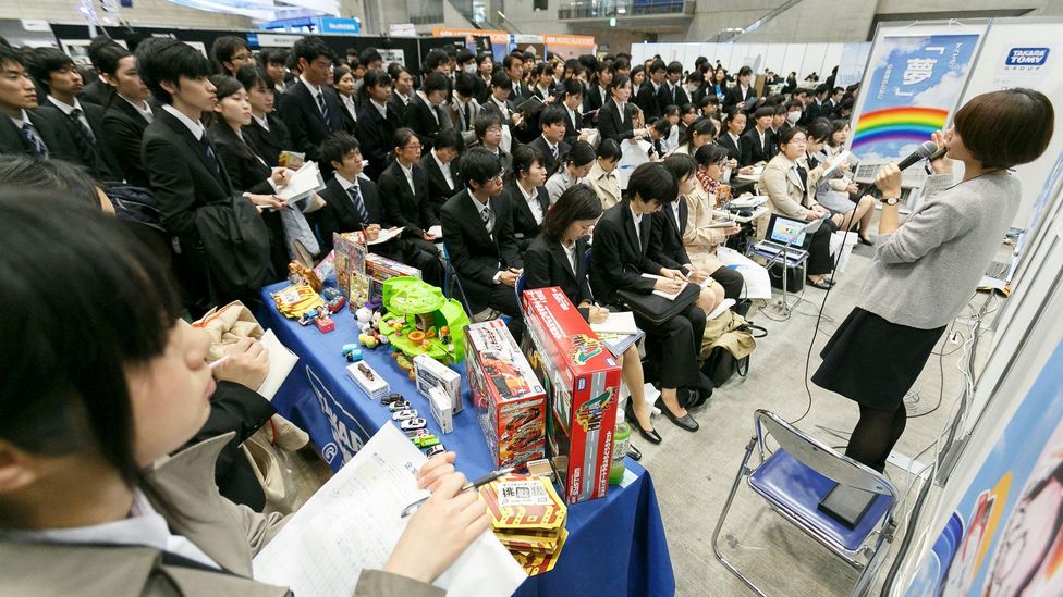 Traditionally, Japanese university students attend presentations from company recruiters during the job-seeking season of ‘shūshoku katsudō’, or shūkatsu (Credit: Alamy)