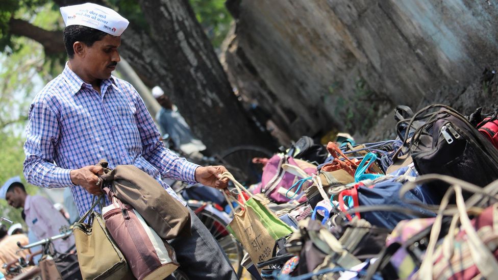 Dabbawala, a 125-year-old delivery service in India, can now be used with an app. With satellite internet, more Indians could access such apps (Credit: Getty Images)