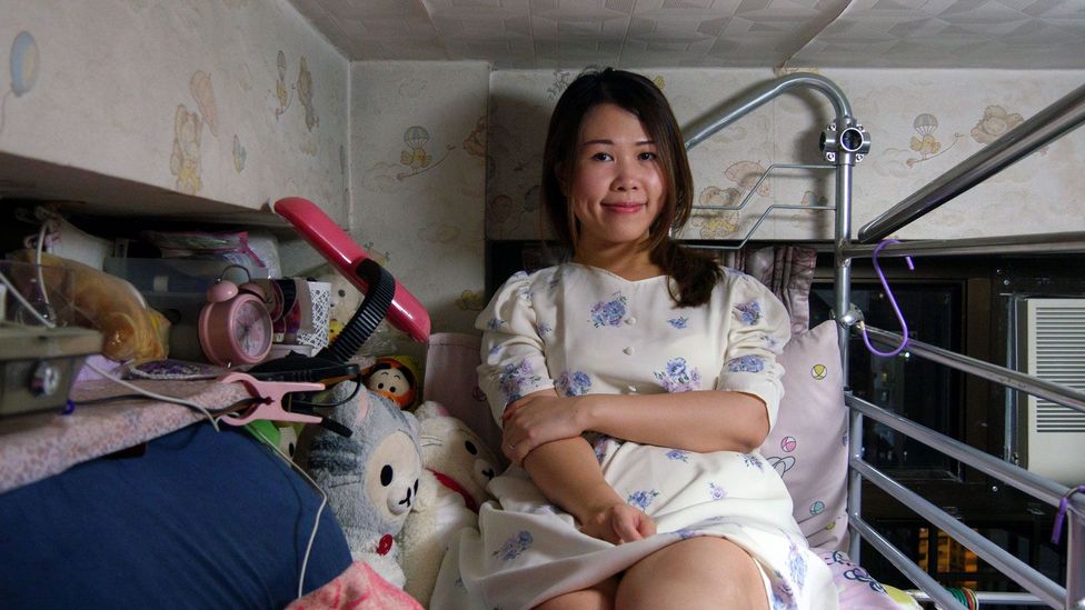 Joyce Leung, 30, lives at home with her family instead of with husband, Wilfred Wong, 30. She sleeps in her childhood bunk bed scattered with stuffed animals (Credit: Megumi Lim) Joyce Leung, 30, lives at home with her family instead of with husband, Wilfred Wong, 30. She sleeps in her childhood bunk bed scattered with stuffed animals (Credit: Megumi Lim)