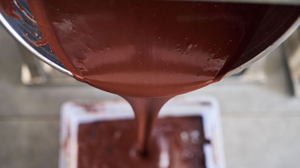 Liquid chocolate being poured into a mould