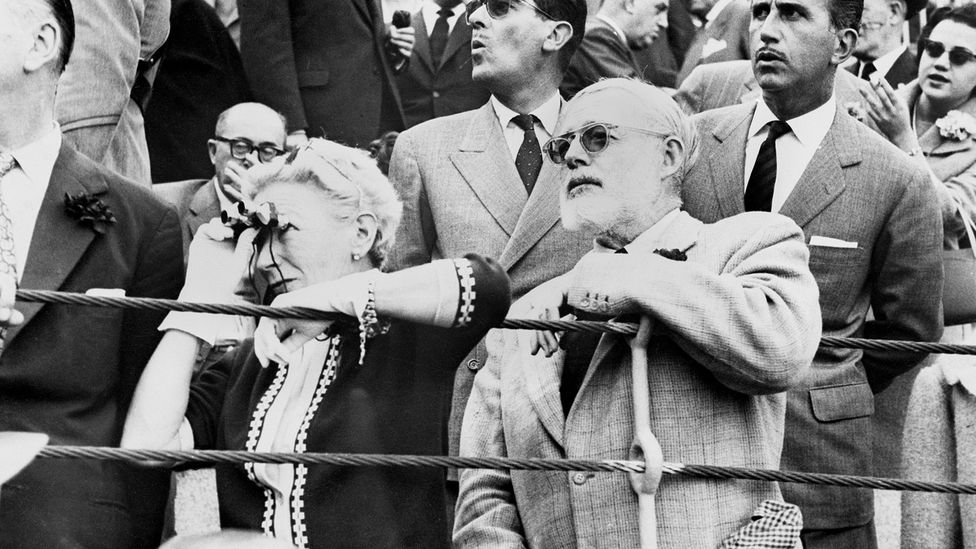 Author Ernest Hemingway watches a bullfight (Credit: Getty Images)