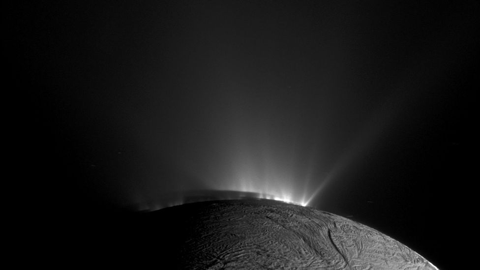 Plumes of water have been pictured shooting up from the surface of Saturn's moon Enceladus (Credit: Getty Images)