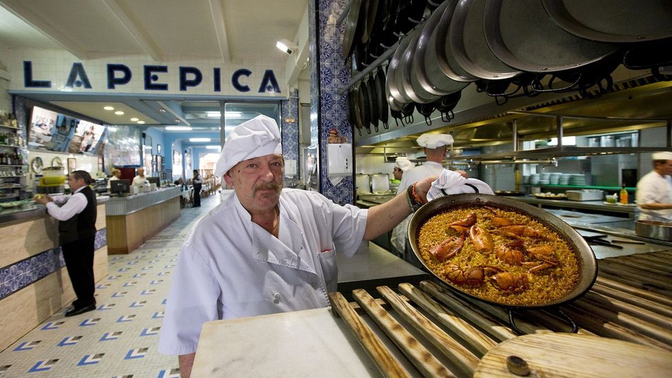 For three generations, La Pepica has used the same recipes to make its paellas (Credit: Petter Oftedal/Alamy)