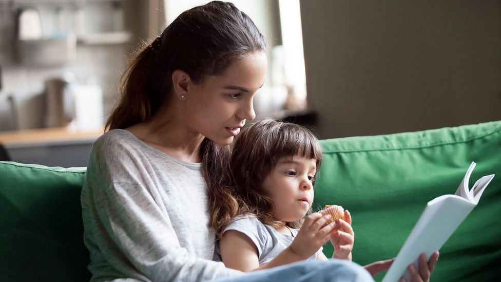 Being engaged in an interactive activity, like reading, makes the two participants' brain patterns converge (Credit: Getty Images)