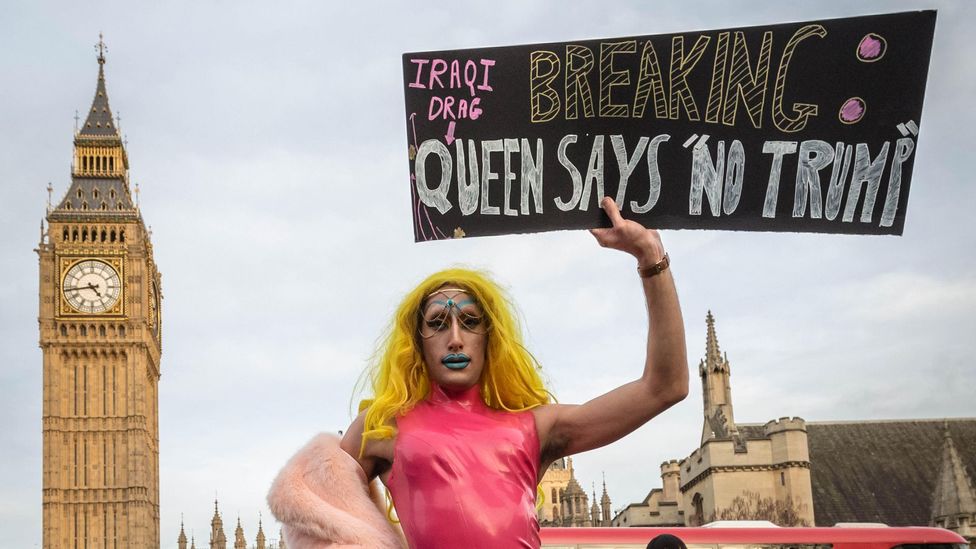 Amrou Al-Kadhi, aka Glamrou, here seen taking part in Anti-Trump protests in Westminster in 2017, uses drag as a political tool (Credit: Alamy) Amrou Al-Kadhi, aka Glamrou, here seen taking part in Anti-Trump protests in Westminster in 2017, uses drag as a political tool (Credit: Alamy)