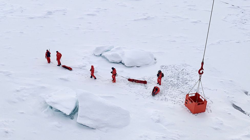 Scientists take their first steps on the new floe, which they hope will become their new home (Credit: AWI/Sebastian Grote) Scientists take their first steps on the new floe, which they hope will become their new home (Credit: AWI/Sebastian Grote)
