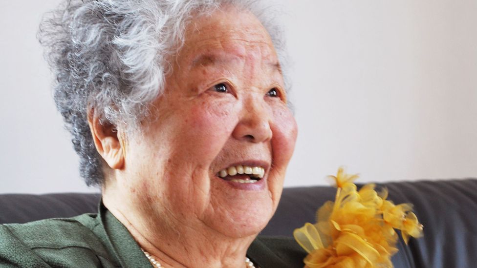Photograph of an elderly Japanese lady smiling