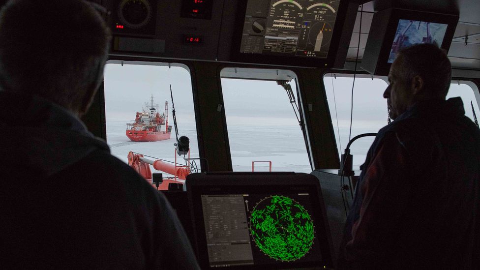 On the bridge of the Polarstern, volunteers take turns looking out for the changing ice conditions while the crew search for the right floe to moor to (Credit: Esther Horvath/AWI) On the bridge of the Polarstern, volunteers take turns looking out for the changing ice conditions while the crew search for the right floe to moor to (Credit: Esther Horvath/AWI)