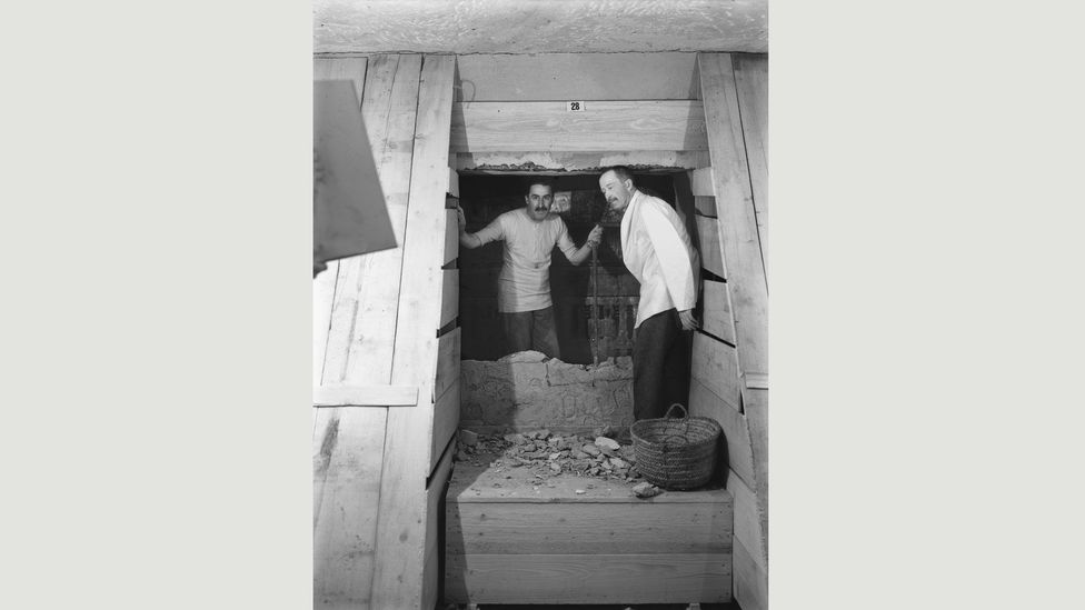 Burton staged his photos to make them as dramatic as possible; taken in February 1923, this image is one of only two showing Carter (left) and Lord Carnarvon together in the tomb