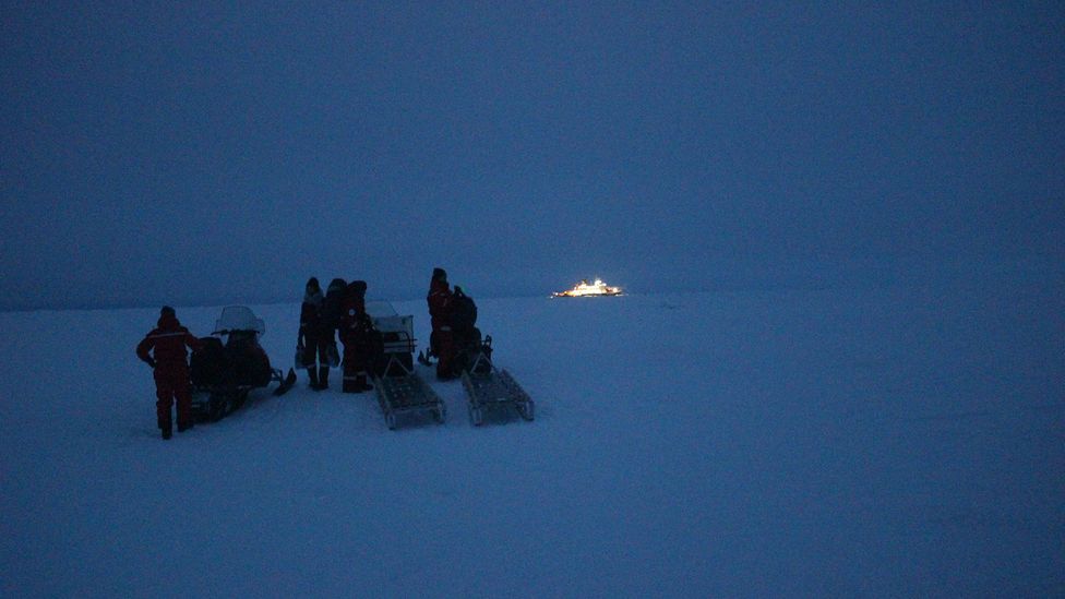 Scientists wait to leave the ice floe by helicopter, to travel back to the Akademik Fedorov (Credit: Martha Henriques) Scientists wait to leave the ice floe by helicopter, to travel back to the Akademik Fedorov (Credit: Martha Henriques)