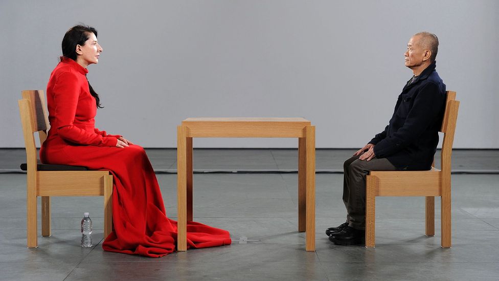 For her 2010 performance The Artist is Present, Marina Abramović met the gaze of strangers at MoMA – many of whom were moved to tears (Credit: Getty Images)