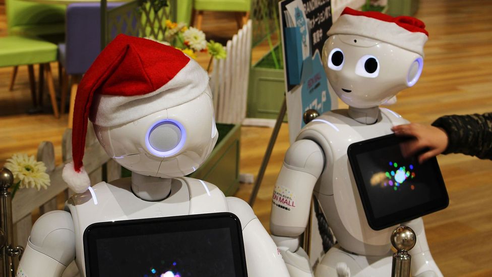 Pepper is a semi-humanoid robot designed to 'read emotions' with several being used in the service and retail industries (credit: Ned Snowman/Alamy Stock Photo)