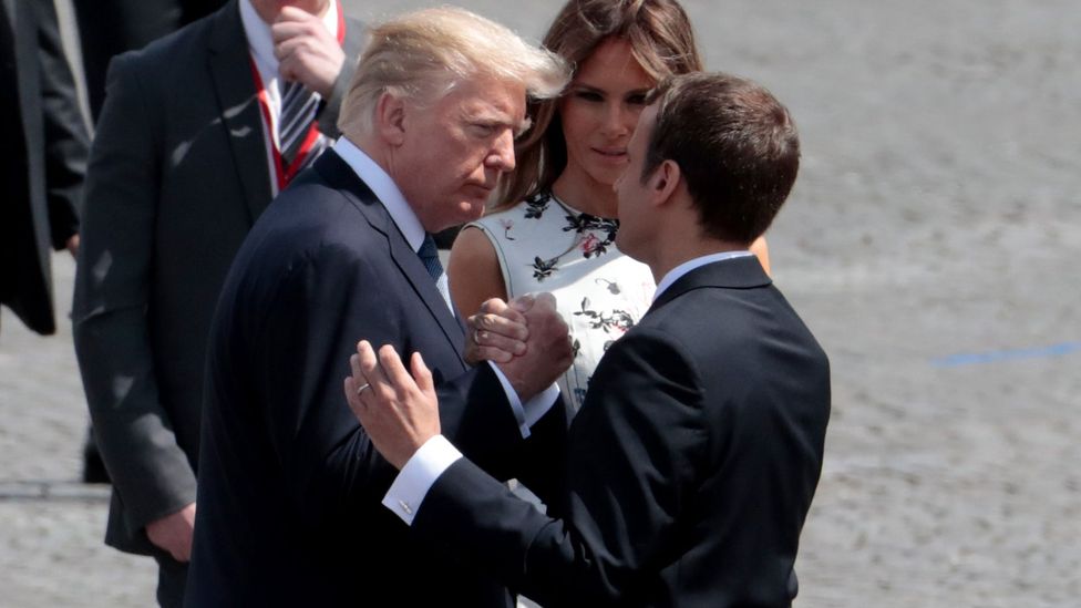 Donald Trump and Emmanuel Macron demonstrated everything a handshake should not be during their awkward exchange in Paris (Credit: Getty Images)