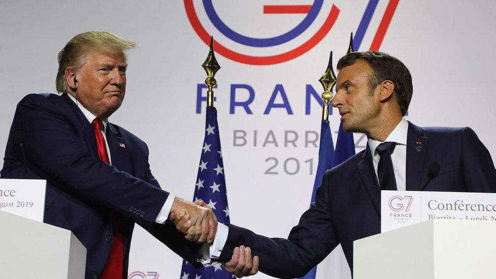 It often appears more like an arm wrestle than a handshake when Donald Trump and Emmanuel Macron are together (Credit: Getty Images)