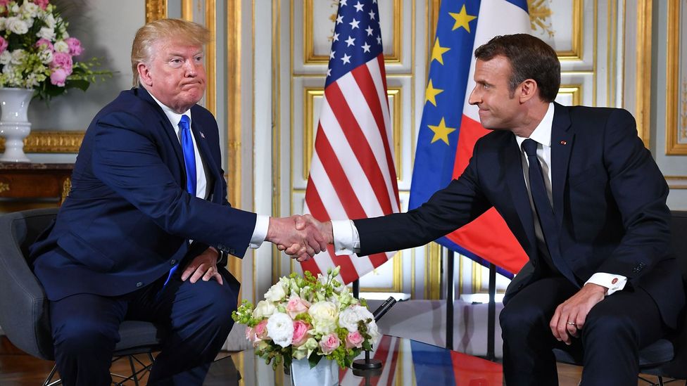 Donald Trump and Emmanuel Macron have a bit of a history when it comes to intense handshakes (Credit: Getty Images)