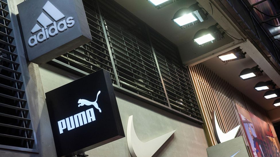 Global sportswear brands Adidas and Puma were created by competing German brothers who both left their family's once-unified shoe business (Credit: Alamy)