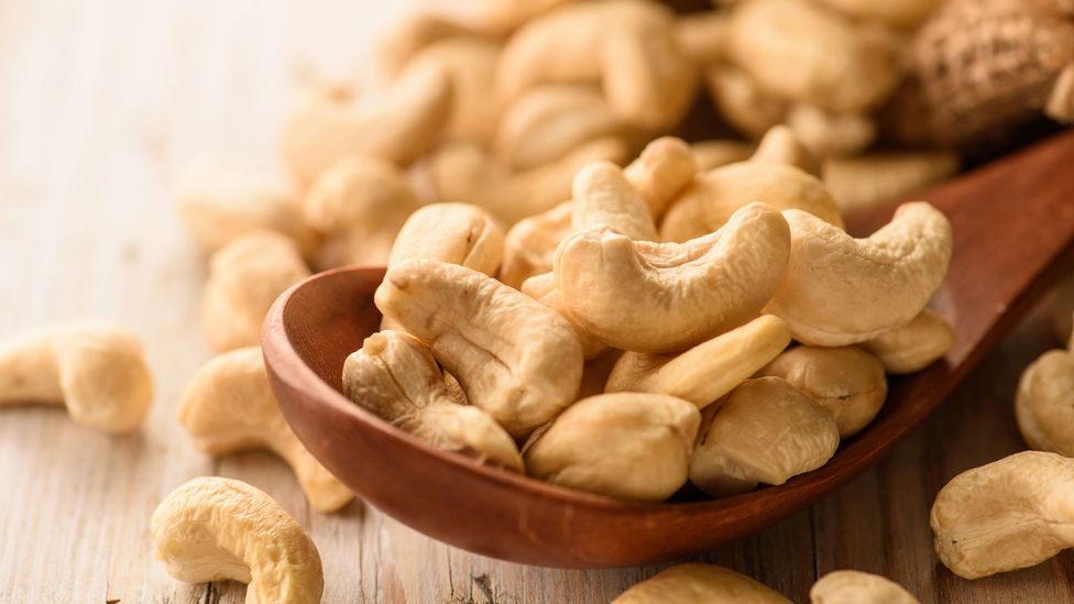 Cashew nuts are one of the most water-intensive nuts to grow - some 909 gallons (4,134 litres) of water per kilogram of shelled nuts (Credit: Getty Images)