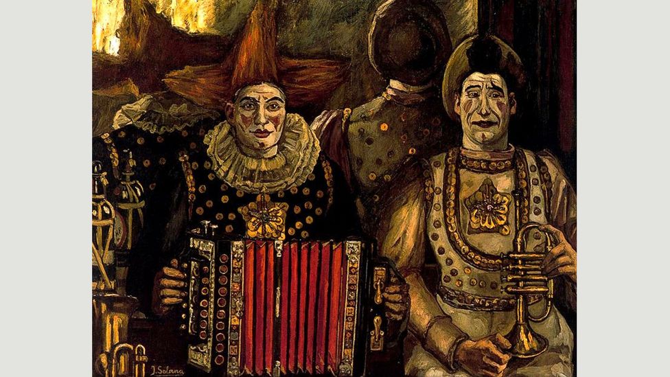 Solana’s 1920 painting, The Clowns, conveys a sense of dread through nuanced facial expressions (Credit: Museo Nacional Centro de Arte Reina Sofía)