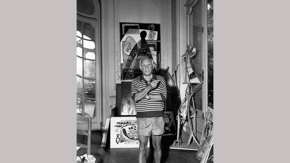 Picasso in his villa La Californie in Cannes, which was crammed with stuff – scrolls of paper, boxes, and jars of paint filled every surface Picasso in his villa La Californie in Cannes, which was crammed with stuff – scrolls of paper, boxes, and jars of paint filled every surface