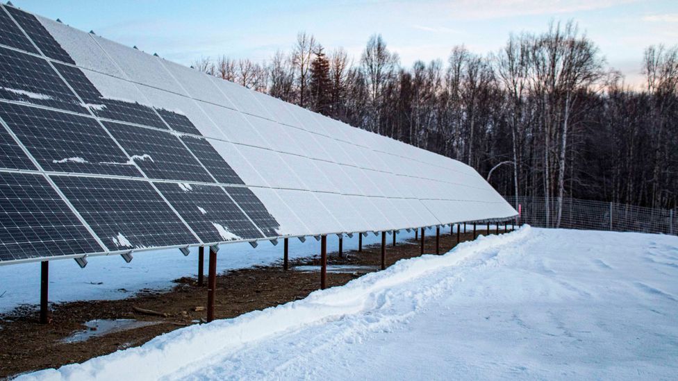 Snow obstructing the sunlight can put solar panels out of action, and requires regular clearing in colder months (Credit: Fischer Knapp)