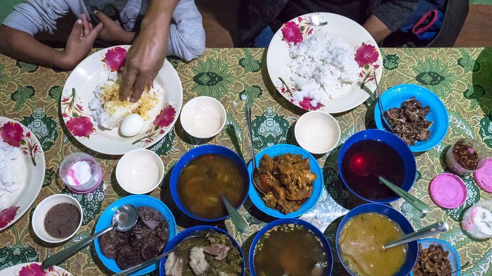 Mizo meals feature staples like smoked pork boiled with mustard leaves and bai (Credit: Pearly Jacob)