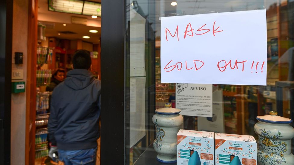 One of the ways panic buying backfires is that it depletes supply for goods needed by medical professionals, like this pharmacy selling face masks in Milan (Credit: Getty Images)