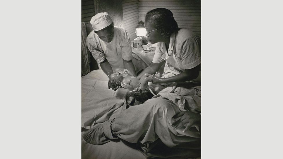 Midwife Maude Callen delivers a baby, Pineville, South Carolina, 1951 by W Eugene Smith (Credit: The Picture Collection Inc)