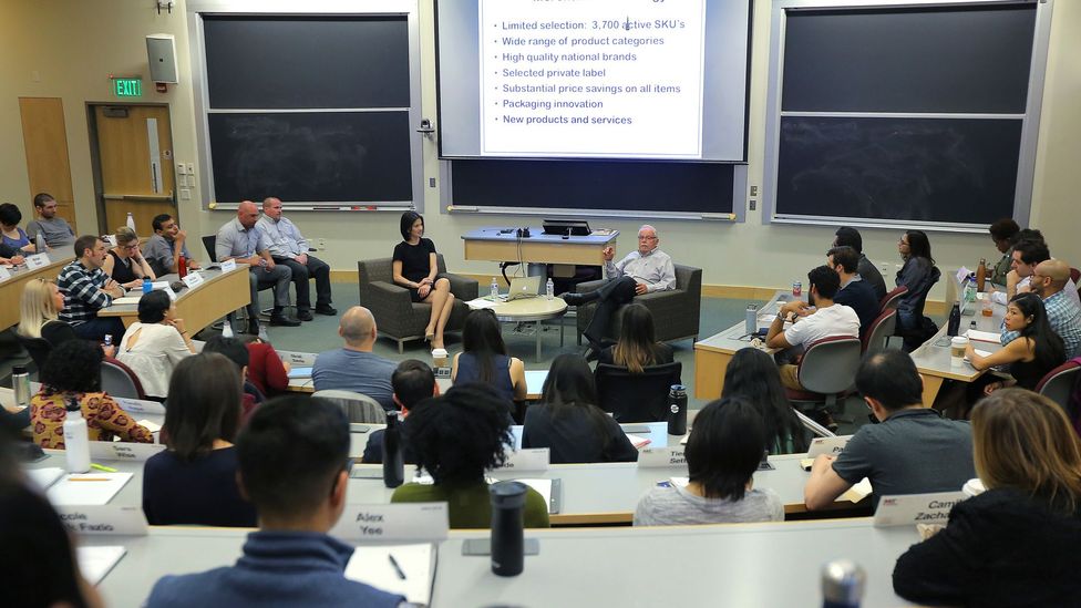 Former Costco CEO James Sinegal speaks to students in an operations management class at the MIT Sloan School of Management. (Credit: Getty Images) Former Costco CEO James Sinegal speaks to students in an operations management class at the MIT Sloan School of Management. (Credit: Getty Images)